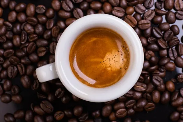 20230414194230-espresso-cup-with-coffee-beans.webp